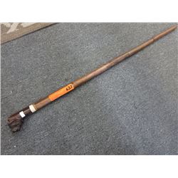 Folk art cane with carved lion head handle