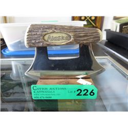 Alaskan Ulu knife on stand
