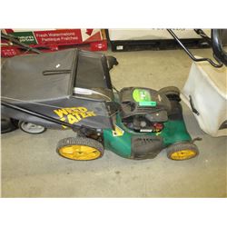 Weed Eater brand - gas powered lawnmower - used