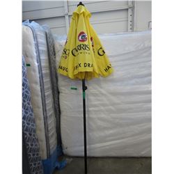 Patio umbrella with Garrison Brewing logo