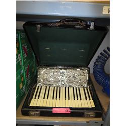 Vintage Hohner accordion with strap and case