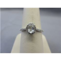 White Topaz ring set with a genuine Diamond