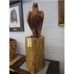 Cedar chainsaw carving of an Eagle