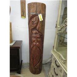 Cedar chainsaw carving of a  Mountain Man