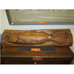 Chainsaw log carving of a Salmon