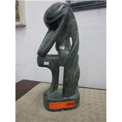Carved stone statue