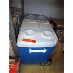 Rubbermaid rolling ice chest & contents