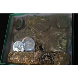 Selection of Caribou carnival one dollar coins from Yellowknife dated 1970 and 1980's etc.