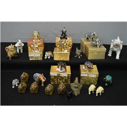 Selection of small elephant collectibles including enamelled with boxes and embellished with Swarvos