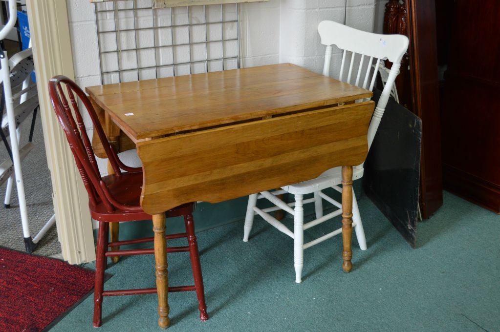 Double drop leaf kitchen table and two mismatched painted chair