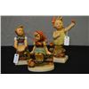 Image 1 : Three Goebel Hummel figurines including "Little Helper", "Just Resting" and "Spring Cheer"