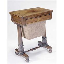 A William IV rosewood rectangular games/work table, the folding top with a chequer board, the fri...