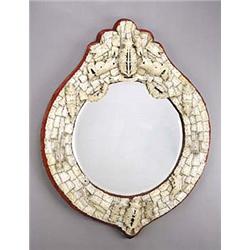 A 19th century 'Dieppe' carved bone wall mirror with round mirrored plate and motto 'sgotorum', 7...