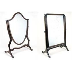 Two mahogany dressing table mirrors; one with a shield shaped mirror plate, 78 high x 54.5cm wide...
