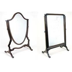 Two mahogany dressing table mirrors; one with a shield shaped mirror plate, 78 high x 54.5cm wide...