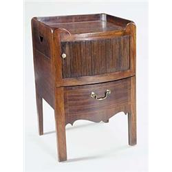 A George III mahogany bowfronted tray top night commode, with a tambour front above a chequer str...