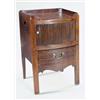 A George III mahogany bowfronted tray top night commode, with a tambour front above a chequer str...