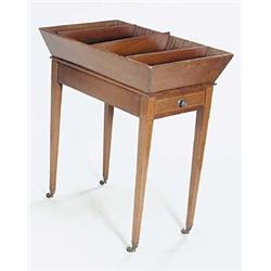 A late 19th/early 20th century mahogany vide poche, the top with an angled gallery and three adju...