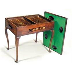 A 19th century Dutch mahogany games table, the rectangular reversible top with a gallery to one s...