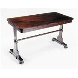 A William IV mahogany rectangular library table,  the plain end supports with a turned stretcher...