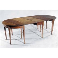 A mahogany 'D' end dining table with two loose leaves, semi-elliptical ends and a central rectang...