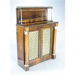 A Regency rosewood and brass chiffonier, the raised back with a pierced brass three-quarter galle...