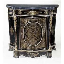 A late 19th century ebonised and brass inlaid side cabinet of serpentine form with gilt metal mou...