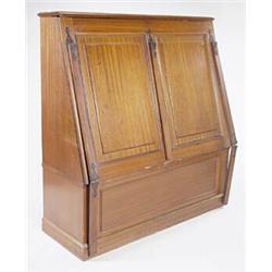 An early 20th century mahogany folio cabinet, the hinged top with a moulded edge above a double p...