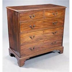 A George III mahogany chest, the top with a moulded edge above two short and three long drawers w...