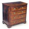 Image 1 : An early 19th century Continental mahogany chest, with canted corners, the crossbanded top above...