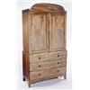 An early 19th century mahogany and ebony strung clothes press, the arched cornice and panelled do...