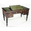 Image 1 : A Victorian mahogany writing table, the crossbanded rectangular top with a moulded edge and an ad...