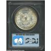 Image 2 : 1884-O S$1 MS64 PCGS. The obverse exhibits muted shades of green, yellow, magenta, and green while t