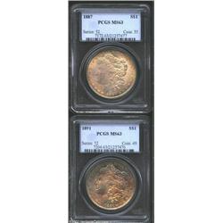 1887 S$1 MS63 PCGS, golden-brown, navy-blue, and rose-violet bands of color, moderate abrasions on e
