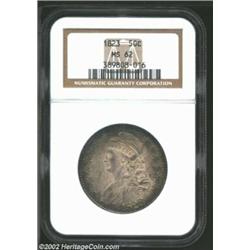 1823 50C MS62 NGC. O-104, R.3. Lilac centers accompany the sea-green, aqua, violet, and gold bands a
