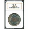 Image 1 : 1882 S$1 MS65 NGC. This brightly frosted Gem is layered in bright Prussian blue and golden-rose toni