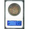 Image 2 : 1882 S$1 MS65 NGC. This brightly frosted Gem is layered in bright Prussian blue and golden-rose toni