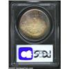 Image 2 : 1884-O S$1 MS66 PCGS. Splendid rainbow toning covers each side of this well struck, carefully preser