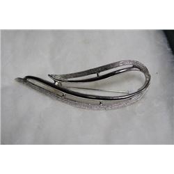 SILVER COLORED BROACH