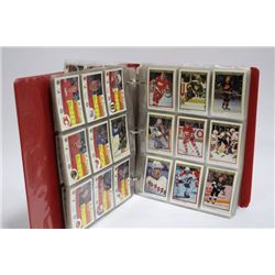 BINDER OF ASSORTED HOCKEY CARDS