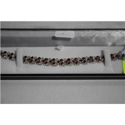 #105 STERLING SILVER RUBY 8CT BRACELET