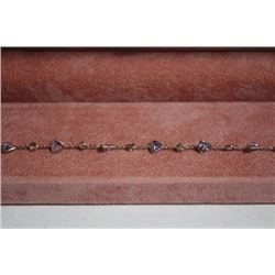 #115 14K GOLD TANZANITE AND WHITE SAPPHIRE 3.65CT