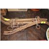 Image 1 : PAIR OF VINTAGE WOOD HORSE HARNESSES