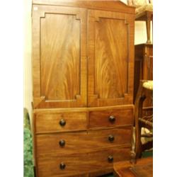 Regency mahogany linen press with flame mahogany panels and domed pediment, all slides intact…