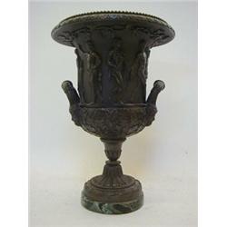 A BRONZE CAMPANA VASE, mid 19th Century, egg and dart rim, cast allegory of the birth of Bacchus,...