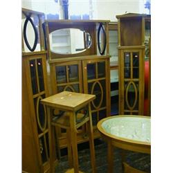A SUITE OF SECESSIONIST PARLOUR FURNITURE, c.1910, birch, ebonised fret features, three vitrines,...