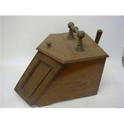 AN OAK PURDONUM, late 19th Century, shovel, Royal coat of arms and 'Patent' plaques to interior, ...