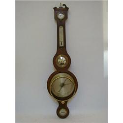 A MAHOGANY AND STRUNG WHEEL BAROMETER, mid 19th Century, signed 'L. Caminada, Manchester', 20cm s...
