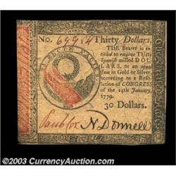 Continental Currency January 14, 1779 $30 New. Very tightly margined on two sides and with some agin