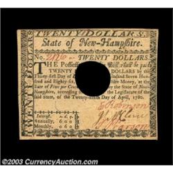 New Hampshire April 29, 1780 $20 Choice New. Canceled with the normal quarter-size hole cancel which